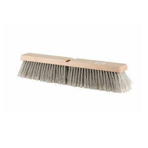 A wooden push broom head with light coloured bristles.